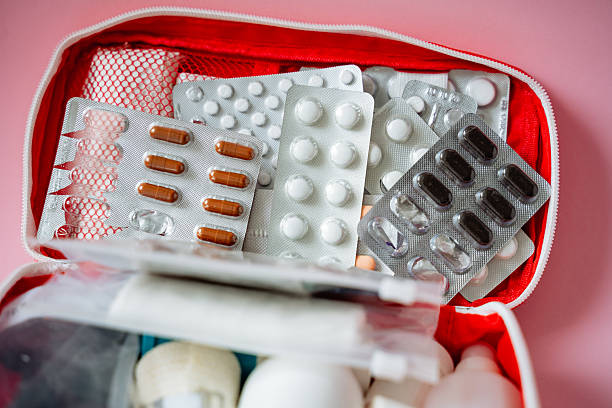 istock A wellequipped first aid kit that contains various essential items such as pills, bandages, syringes, and other medical supplies for treating injuries and health issues effectively 2211144294