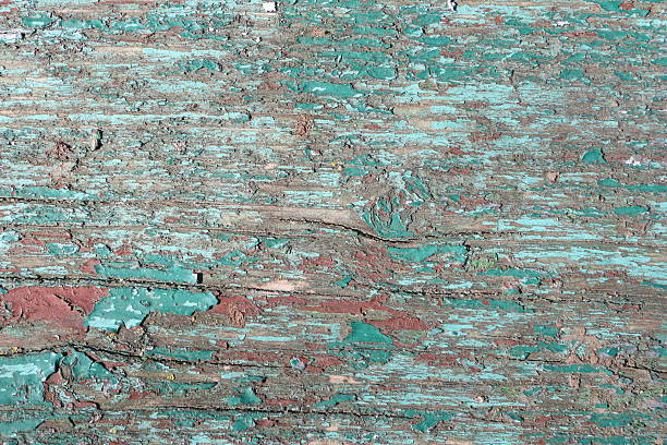 This is a closeup view of beautifully weathered wood that showcases stunning turquoise hues and rustic textures