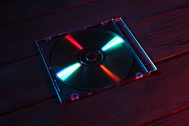 Stack of CDs on white background