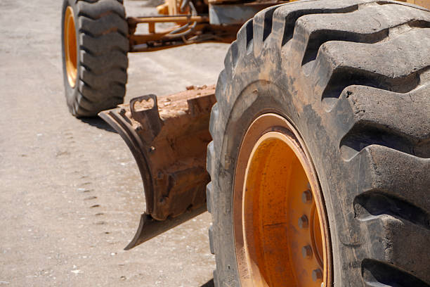 istock Heavy Machinery Tire Close-Up 2211148467