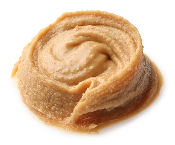 istock Sample of tasty nut butter isolated on white 2211150017