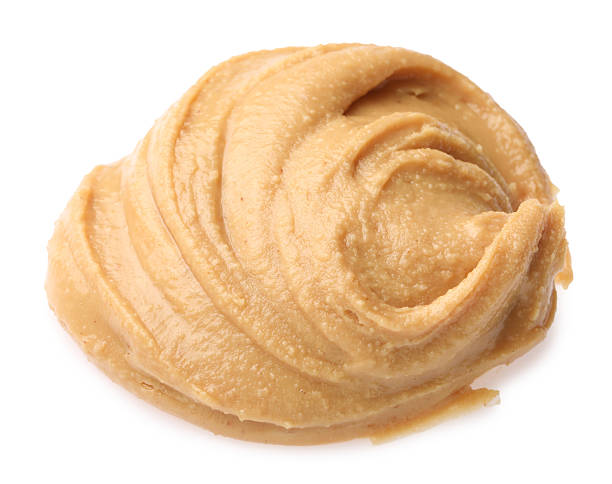 istock Sample of tasty nut butter isolated on white 2211150041