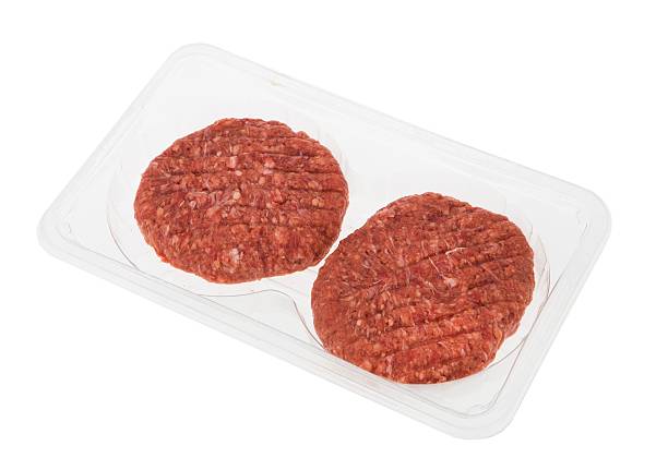 istock Fresh meat wrapped in plastic cup. Food. 2211150121