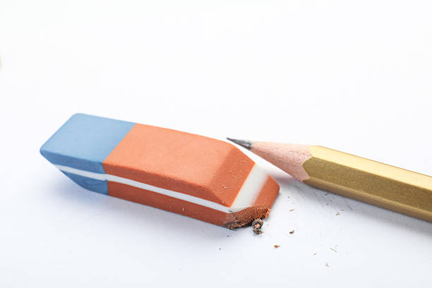 istock Eraser and pencil on white background, closeup 2211150253