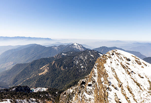 istock snowcap mountain range with bright blue sky at morning 2211150859