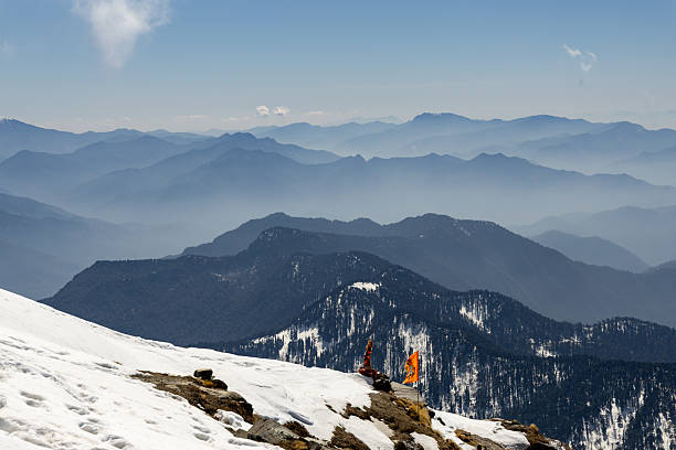 istock snowcap mountain landscape with sacred flag under cloudy blue sky 2211150967