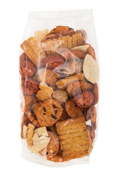 istock Plastic bags with green olives ready to eat. Wrapped in plastic. 2211151654