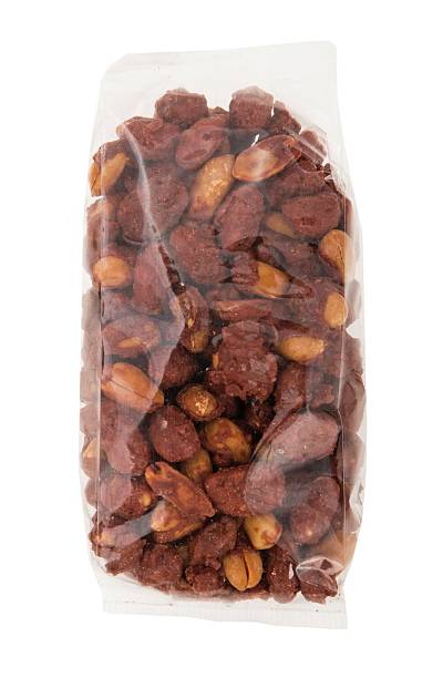 istock Plastic bags with green olives ready to eat. Wrapped in plastic. 2211151679