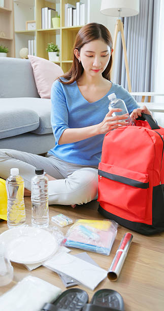 istock Asian woman Emergency Kit Prep 2211156922