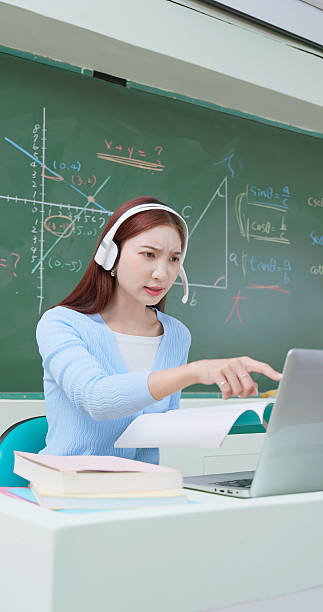 istock Angry teacher scolds online class 2211156976