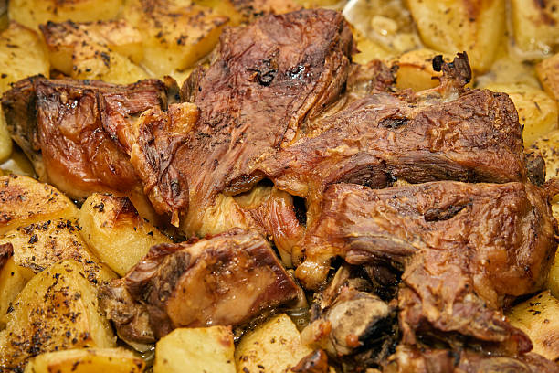 Greek roasted goat and potatoes—a dish that embodies tradition and indulgence! The goat, slow-roasted to tender, flavorful perfection, paired with golden potatoes soaking up all the savory juices and herbs like oregano and thyme, creates a culinary masterpiece. A touch of garlic, olive oil, and a squeeze of lemon elevate this feast to unforgettable heights. It’s a celebration of simplicity and rich Mediterranean flavors.