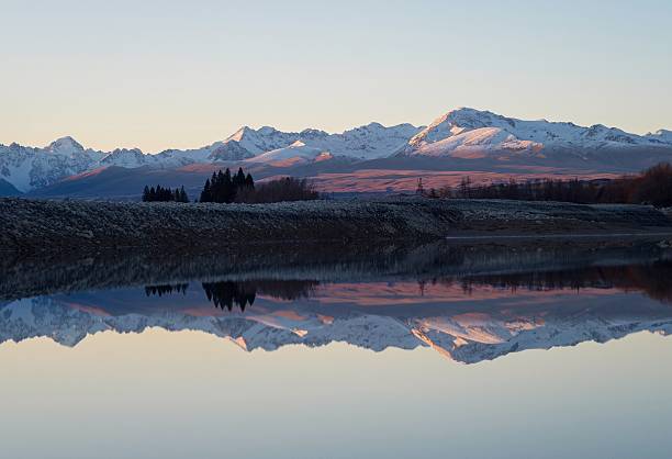 istock Mount Cook Aoraki mountain mirror reflection panorama at Lake Pukaki, alpine soft light sunset landscape, Southern Alps, South Island, New Zealand 2211170605