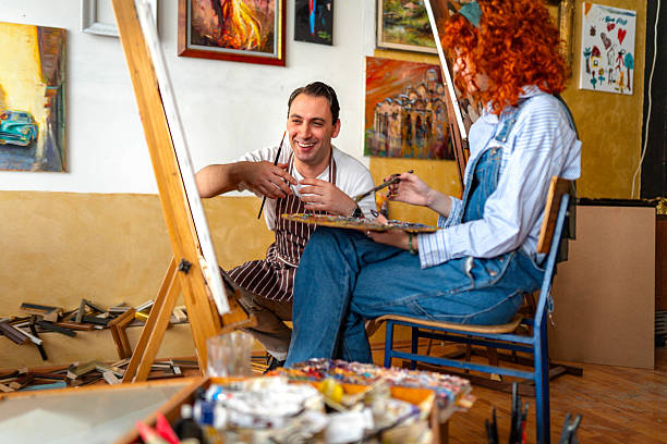 istock Having fun with my art teacher 2211171671