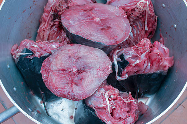 istock some pieces of fresh bonito in a large pot 2211176745