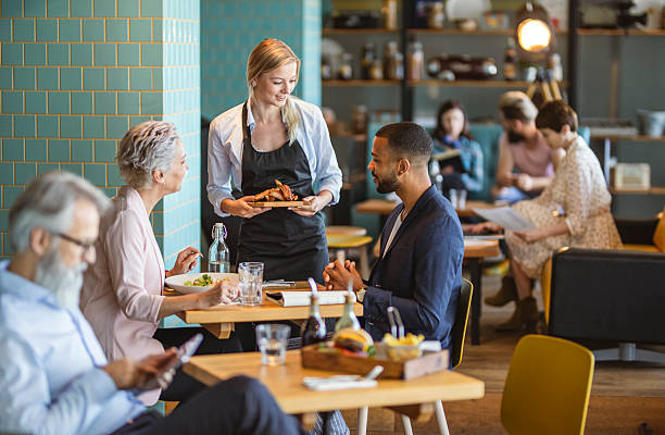 istock Diverse Business Meeting in Cozy Bistro Setting 2211185263