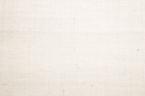 istock Brown sackcloth woven texture background in natural pattern. Jute hessian burlap, linen background in light beige cream color blank. Weaving canvas fiber line cotton cloth textured as organic. 2211185313