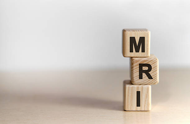 istock MRI - text on wooden cubes text on a background 2211186135