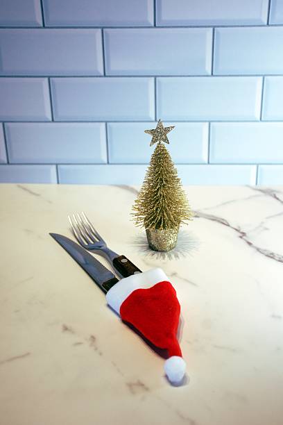 Yellow napkins with white Happy New Year text on blue plate.