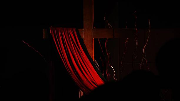 istock Christian Wooden Cross with cloth. 2211197985