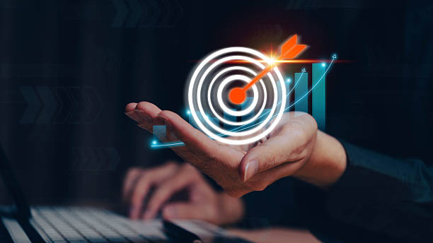 istock Businessman analyzing 2025 profit growth performance for the 2025-2026 financial plan. Image depicts market concepts, finance trends, revenue graphs, money, and profitability analysis for future business strategy. 2211202663