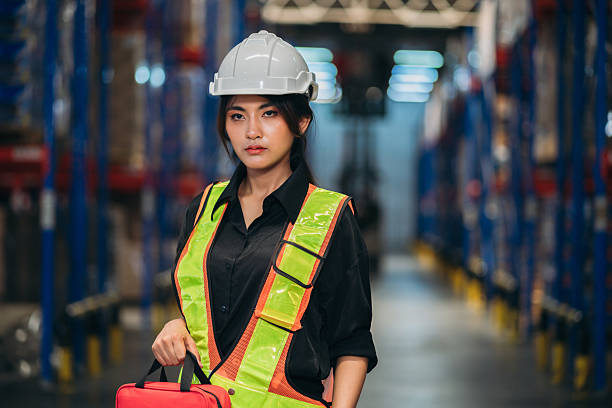 istock Warehouse worker working and checking the stock in the warehouse. 2211207471