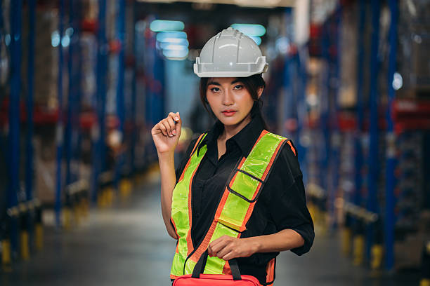 istock Warehouse worker working and checking the stock in the warehouse. 2211207729