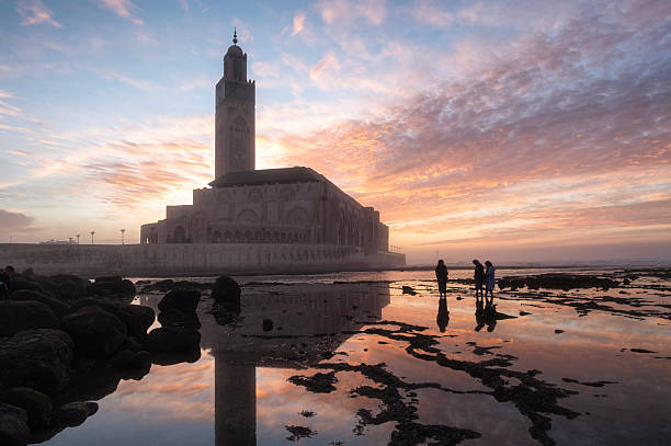 The Hassan II Mosque in Casablanca, Morocco, built in the late 20th century, features one of the tallest minarets in the world and stands partly over the Atlantic Ocean.