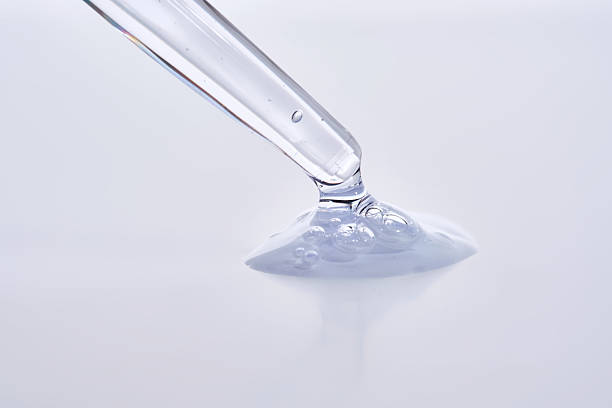 istock Pipette with delicate blue serum close-up. 2211209228