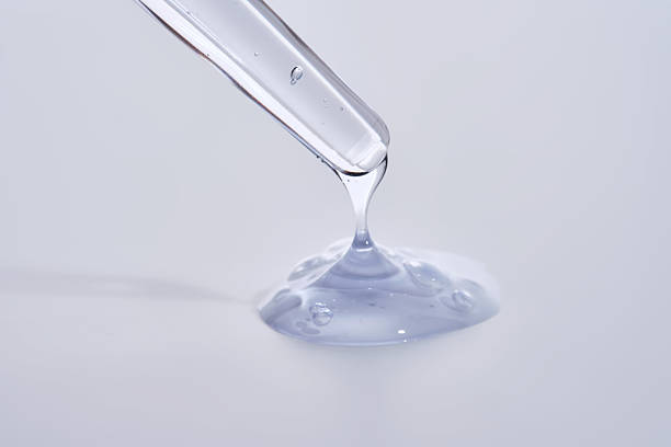 istock Pipette with delicate blue serum close-up. 2211209462
