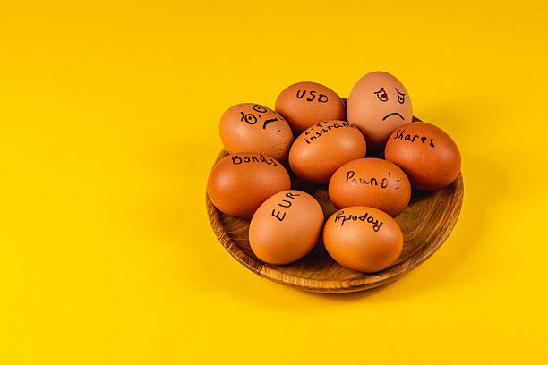 istock Eggs on a plate illustrate investing concepts 2211212372