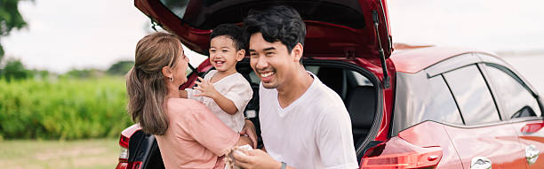 istock Little boy enjoy playing with mother while preparing to continue their journey after resting at a scenic viewpoint. 2211213085