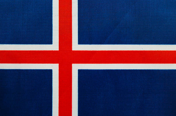 The Icelandic flag is displayed prominently with blue as the background, featuring a bold red cross outlined in white, symbolizing the country's heritage.