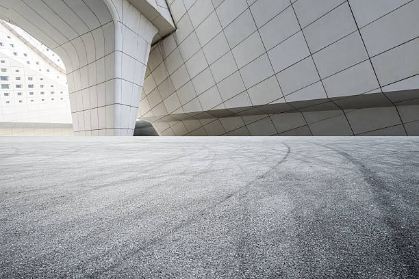 istock Empty asphalt road and modern city building. 2211220532