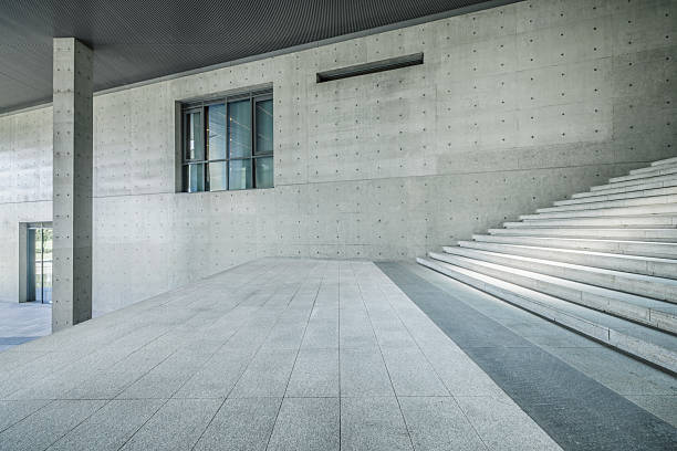 istock Modern building exterior with concrete wall, staircase and empty floor. 2211220776