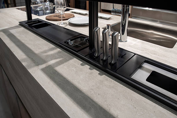 istock Black kitchen organizer with knives and sink area built into the table 2211225065