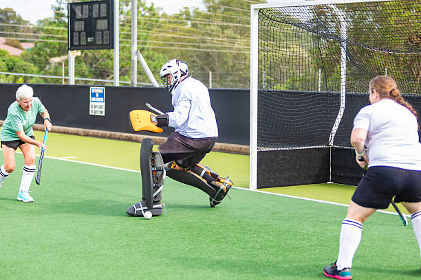istock Field hockey goal being scored 2211225969