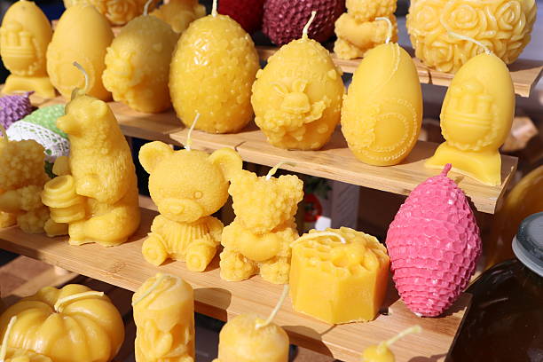 istock Explore Colorful and Decorative Beeswax Candles featuring Various Unique Shapes and Designs 2211226467