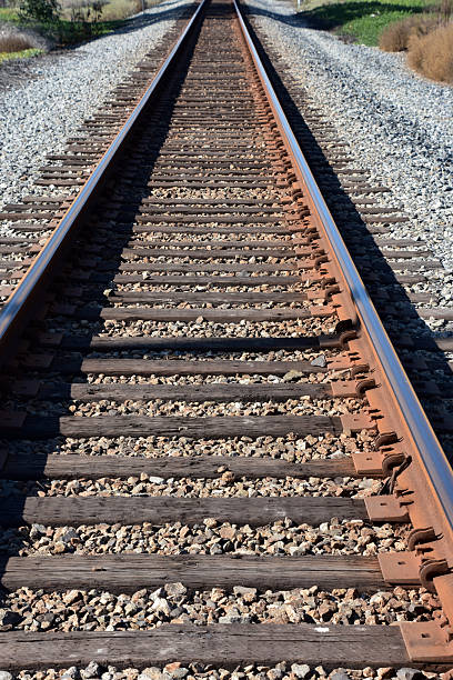istock Railroad Tracks Heading Off Into the Distance 2211228017