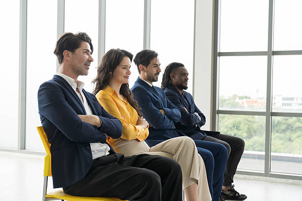 istock Business people, teamwork, team collaboration in meeting, planning, idea strategy, interview of work at office. Business team with documents, paperwork, group of employees in discussion at conference 2211230732