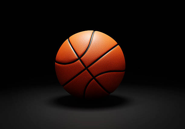 istock Orange basketball ball on black background 2211233837