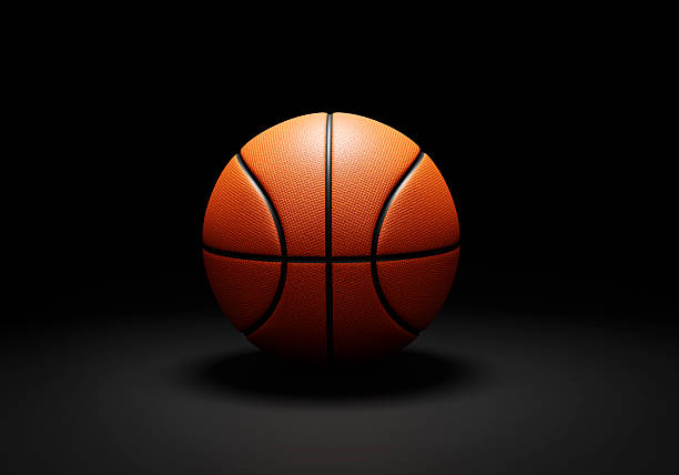 istock Orange basketball ball on black background 2211233838