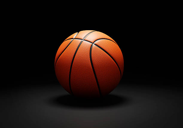 istock Orange basketball ball on black background 2211233840