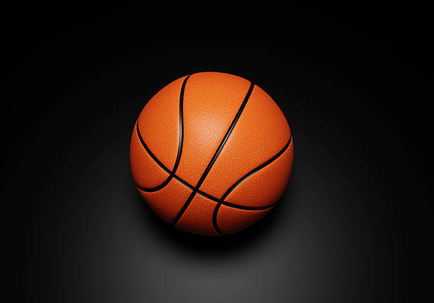 istock Orange basketball ball on black background 2211233847