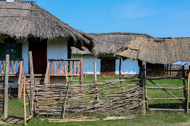 istock A traditional rustic cottage featuring a beautiful thatched roof set within a scenic landscape 2211236470