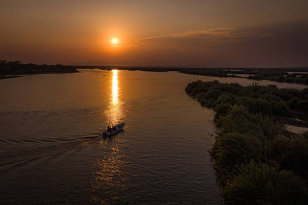 istock Boat Journey Along the Sunset River, Mozambique 2211236884