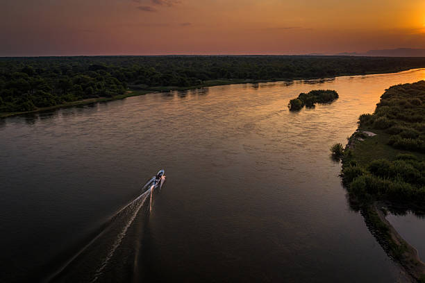 istock Sunset Boat Journey Along the Zambezi River, Mozambique 2211236889