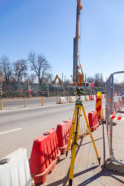 istock An optical road level stands on a road undergoing repairs. 2211237245