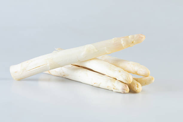 Fresh peeled asparagus isolated nature background with clipping path
