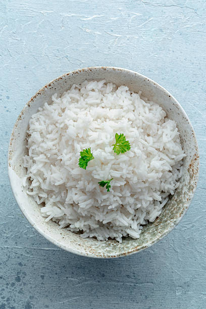 istock White rice, cooked. A bowl of boiled long grain rice, a simple side dish 2211246355