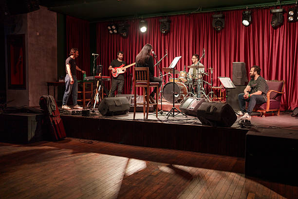 istock Wide Angle View of Musicians on Stage 2211247298